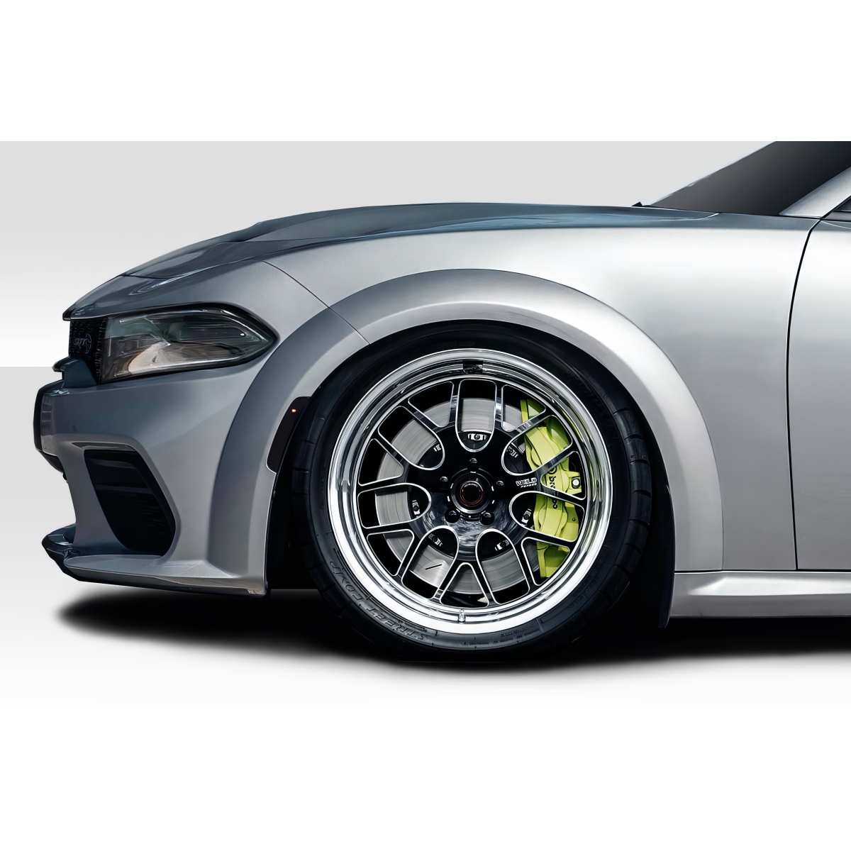 Modify your Dodge Charger 2015 with our Exterior/Fenders - Side angle view of car fender and wheel