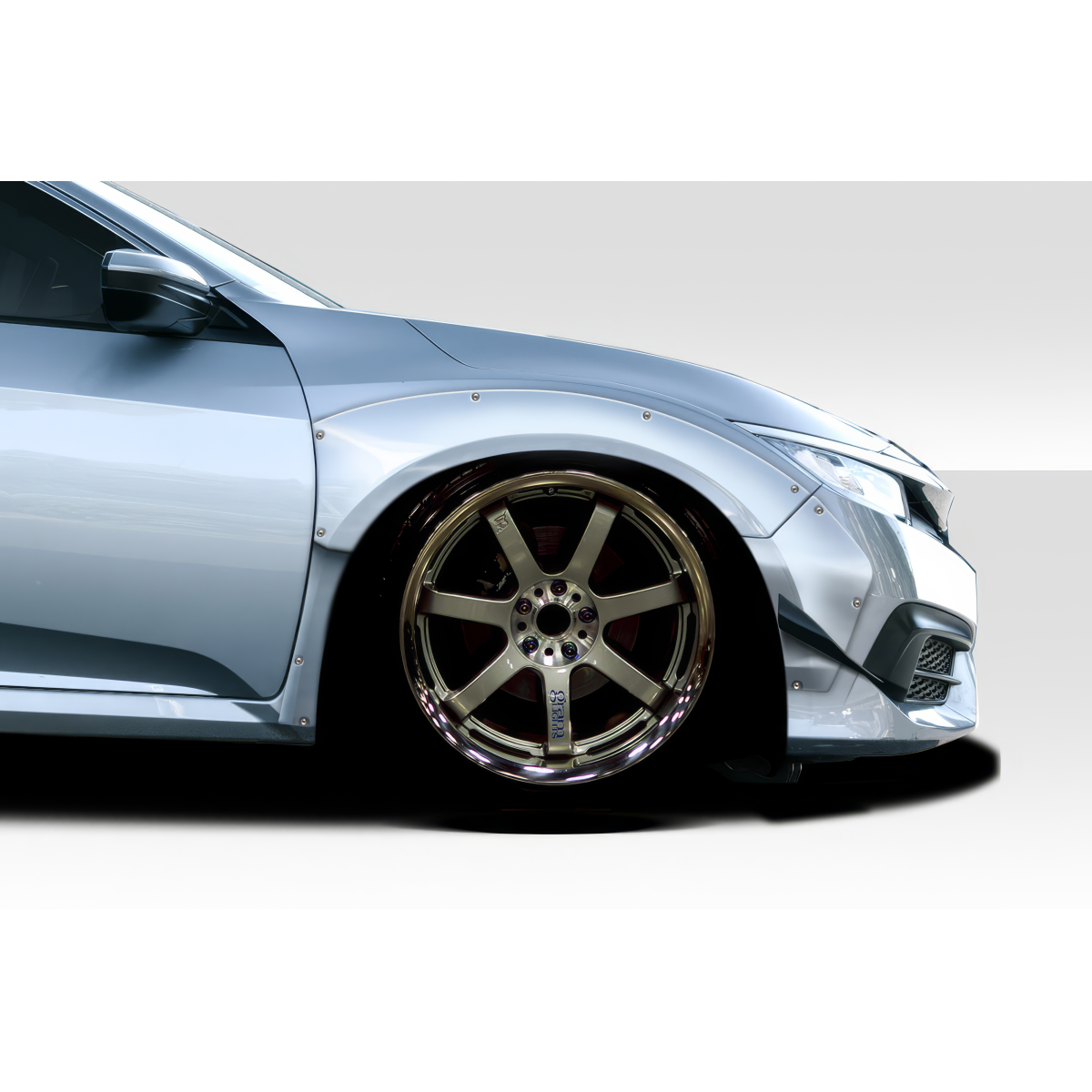 Modify your Honda Civic 2016 with our Exterior/Fenders - Side angle view of car fender and wheel