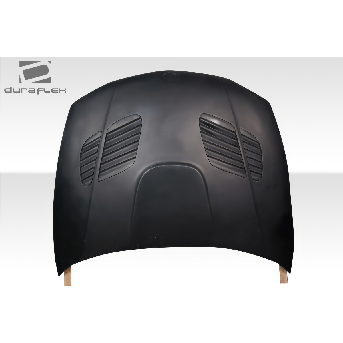 Modify your BMW 1-Series 2008 with our Exterior/Hoods - Front view of hood part at a slight angle