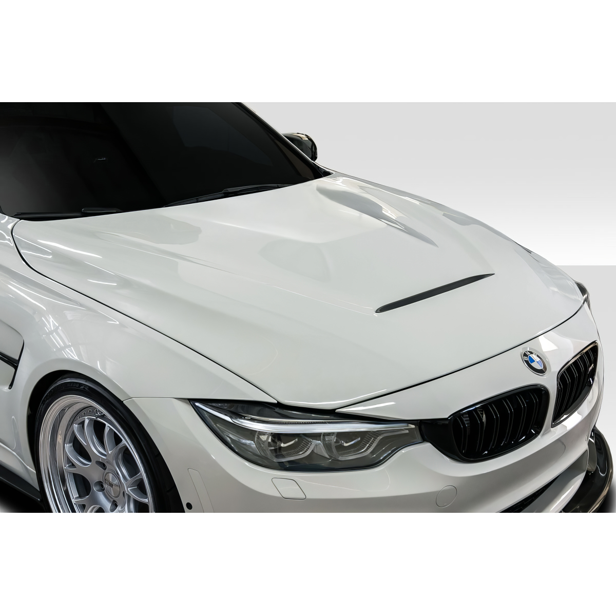 Modify your BMW M3 2014 with our Exterior/Hoods - Front angled view of the BMW M3 hood