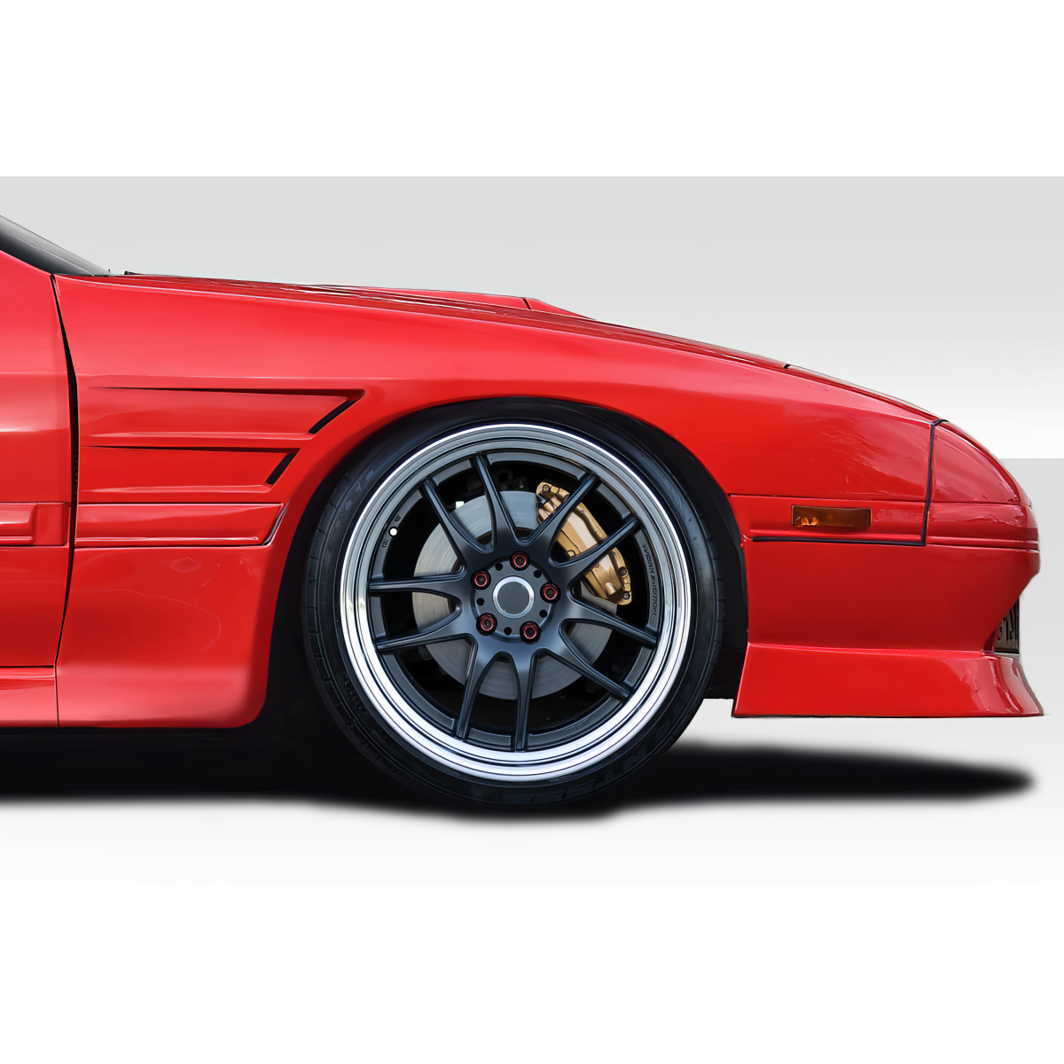 Modify your Mazda RX-7 1986 with our Exterior/Fenders - Side angle focus on front fender and wheel