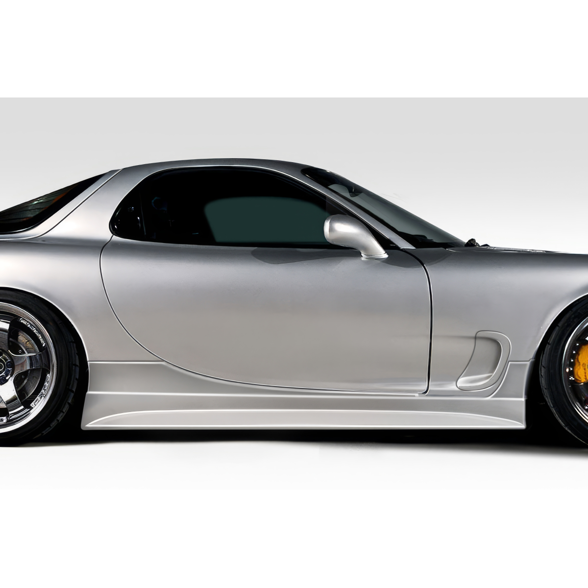 Modify your Mazda RX-7 1993 with our Exterior/Side Skirts - Side view of the vehicle visible at profile angle