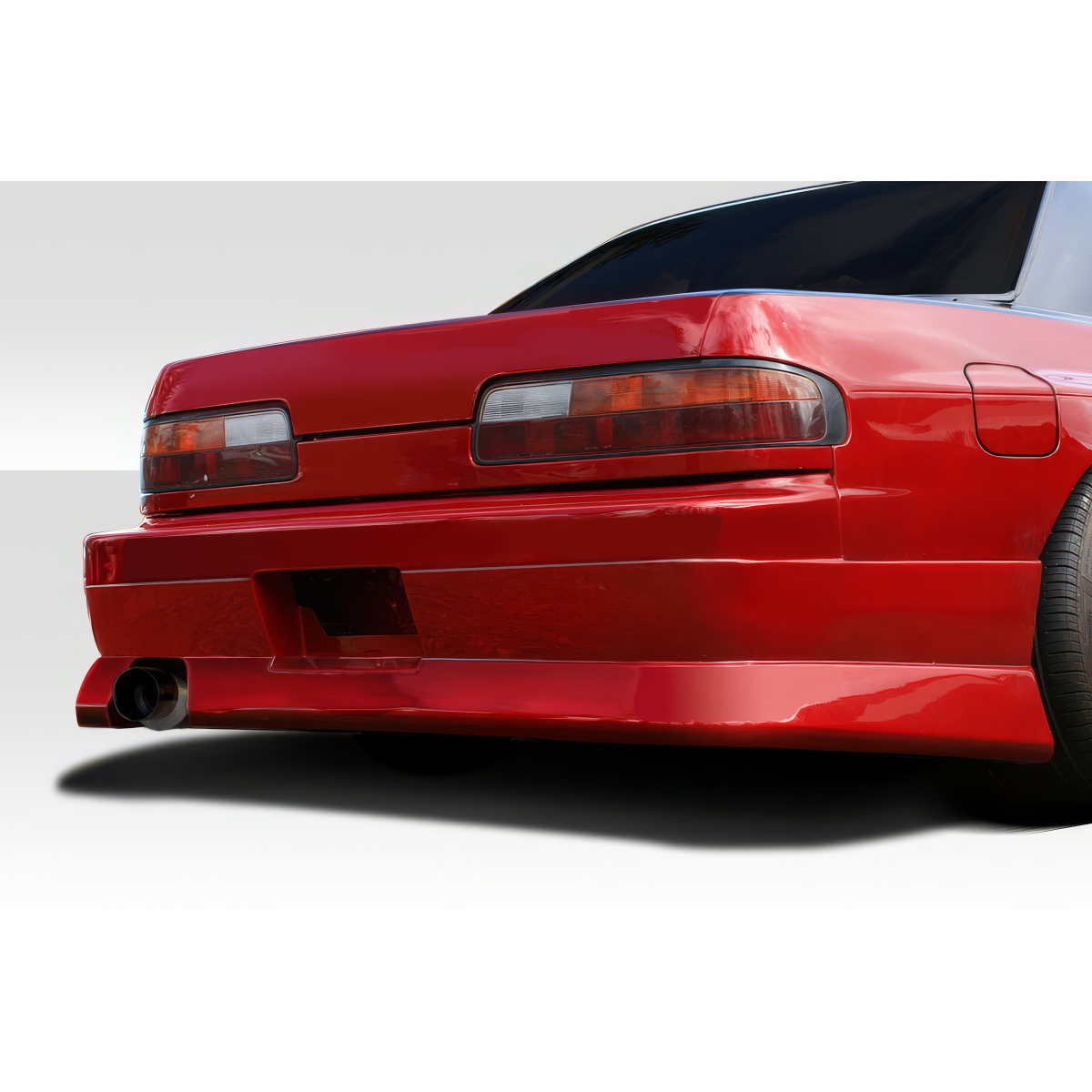 Modify your Nissan 240SX 1989 with our Exterior/Rear Bumpers or Lips - Rear view of car part at a slight angle