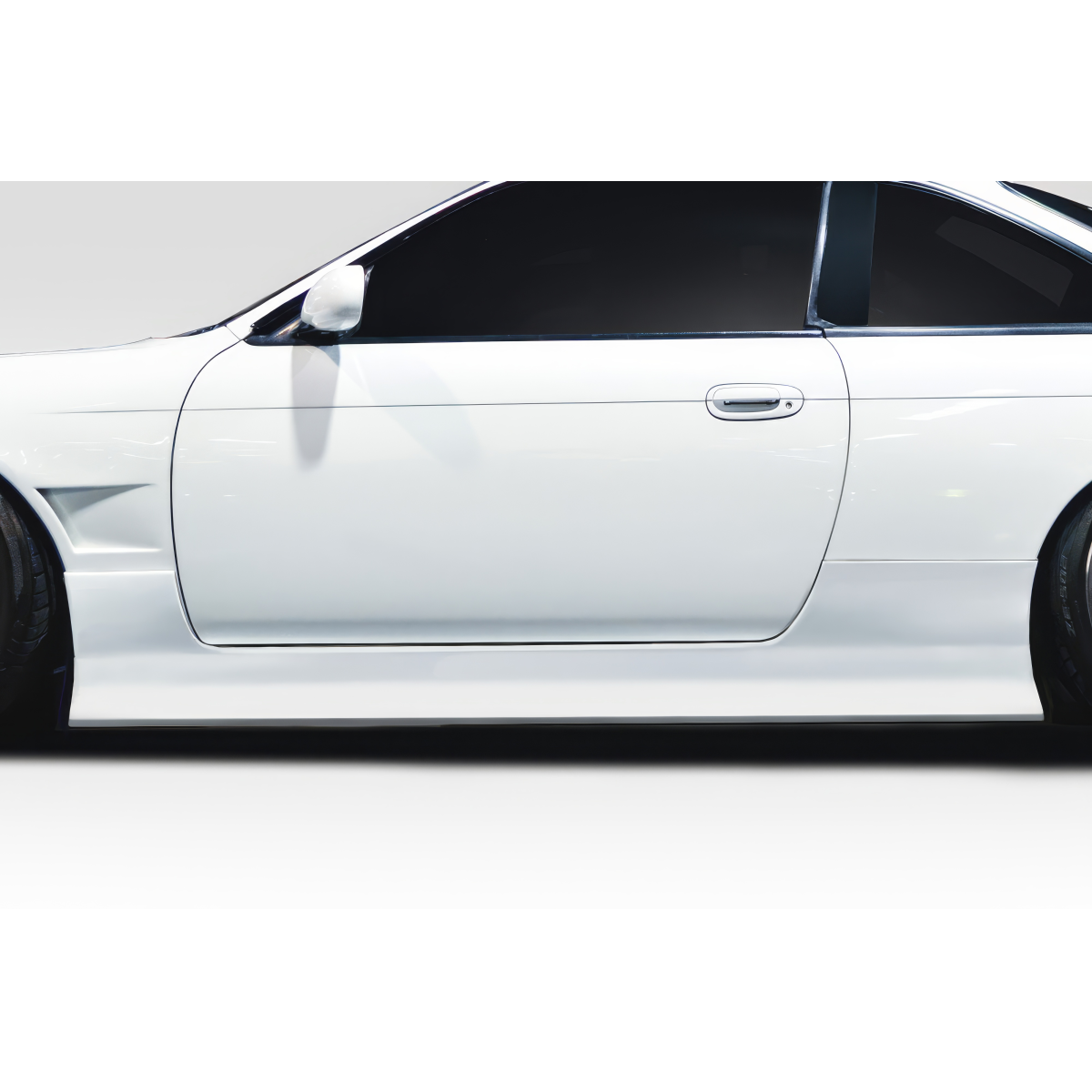 Modify your Nissan 240SX 1995 with our Exterior/Side Skirts - Side view of car with skirt close to ground