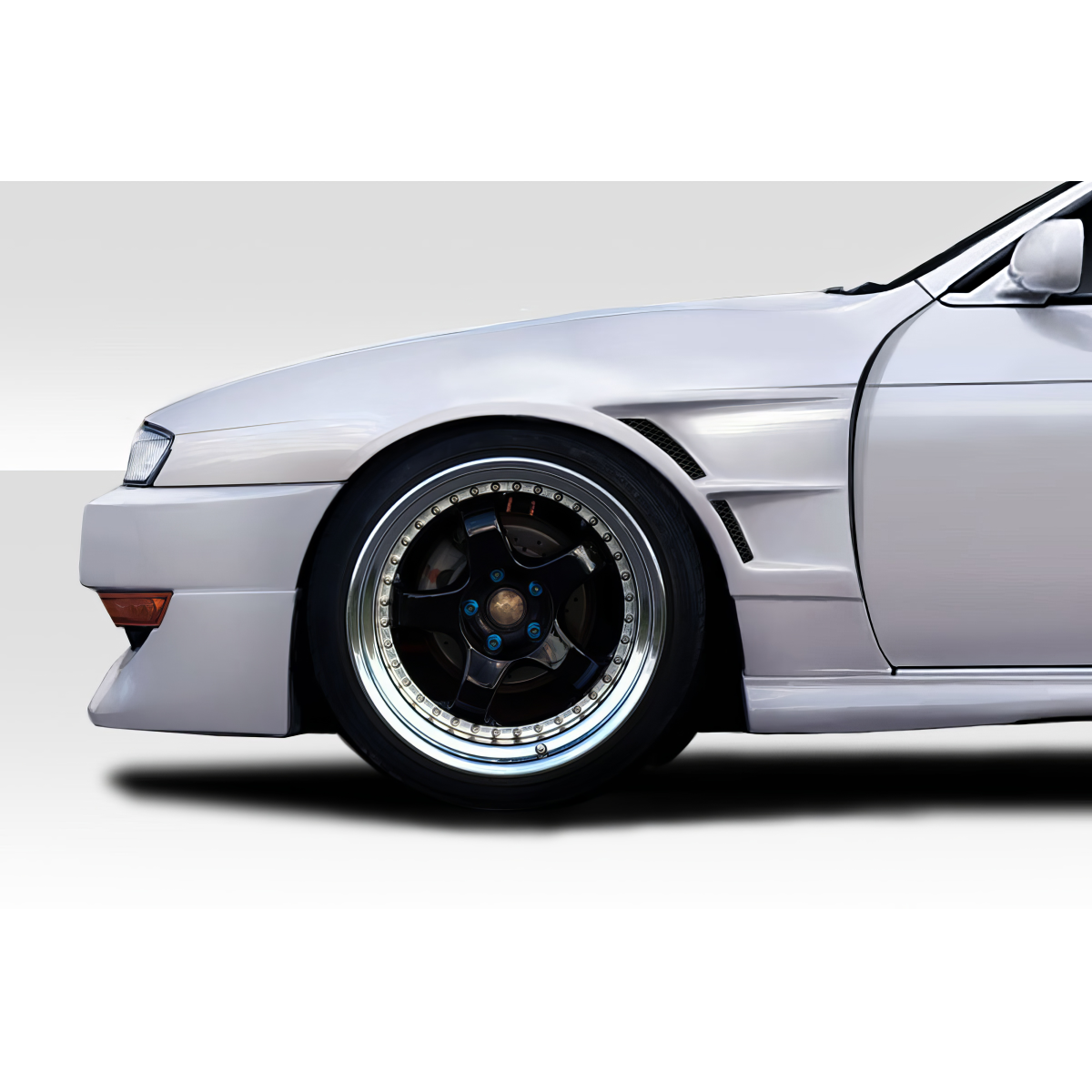 Modify your Nissan 240SX 1997 with our Exterior/Fenders - Side angle showcasing vehicle's front fender and wheel