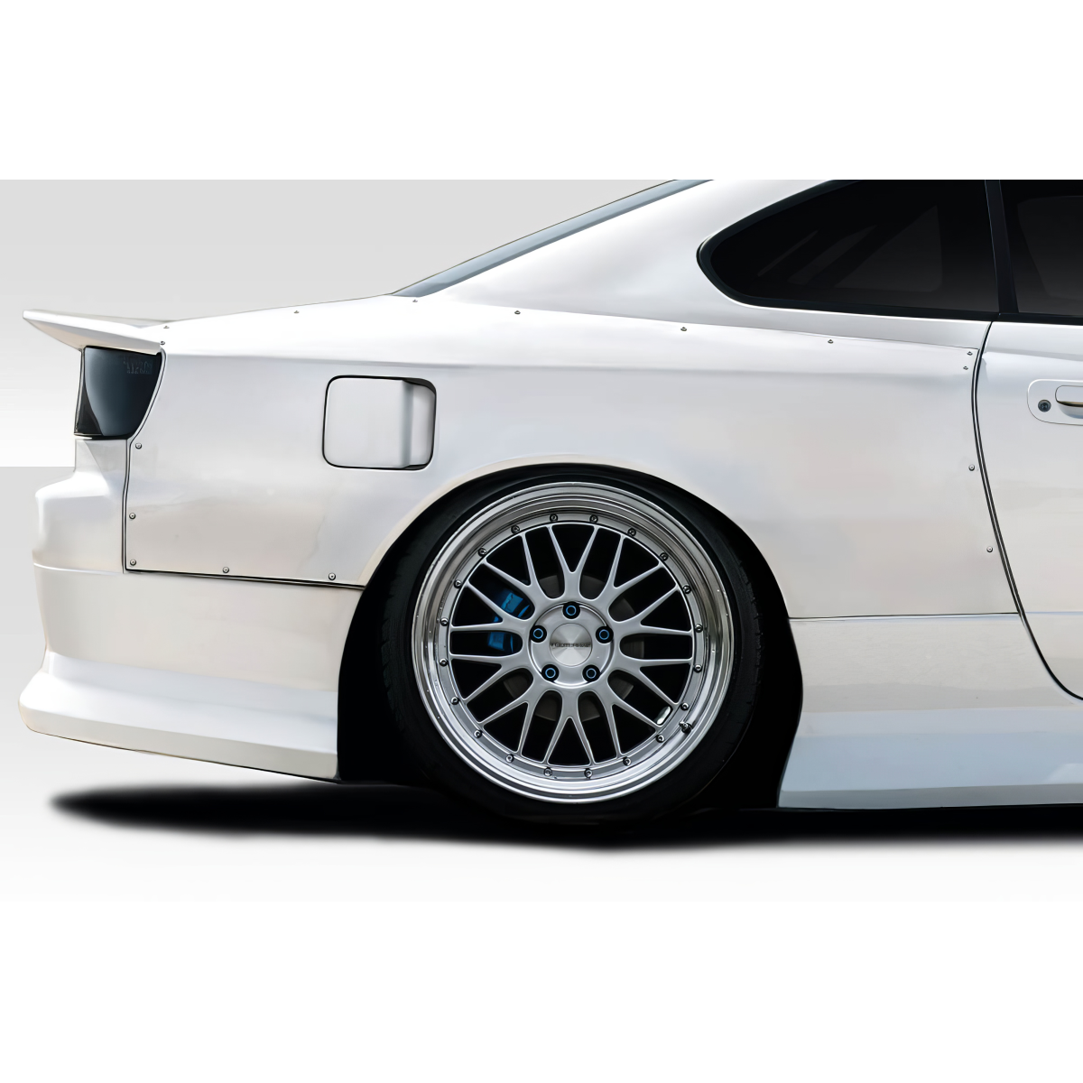 Modify your Nissan Silvia 1999 with our Exterior/Fenders - Side angle view of vehicle with fender flares