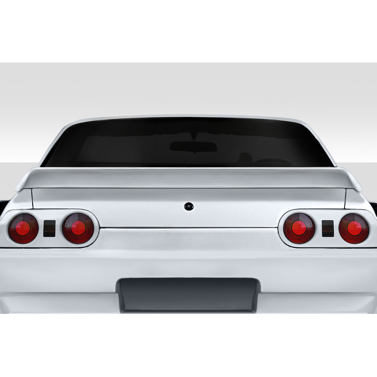 Modify your Nissan Skyline 1989 with our Exterior/Wings - Straight rear view of a car part