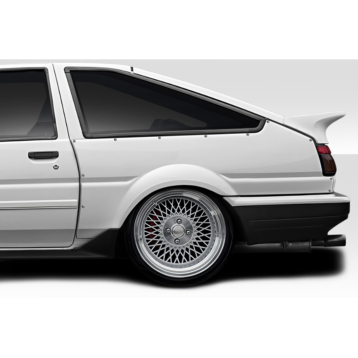 Modify your Toyota Corolla 1984 with our Exterior/Fenders - Side angle showing rear fender flare of car