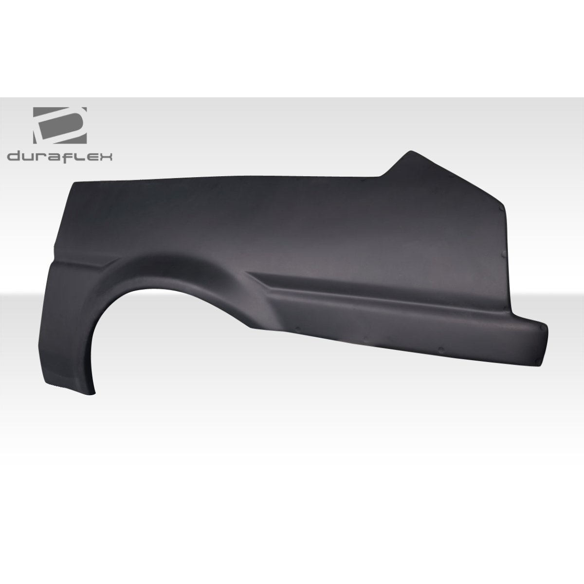 Modify your Toyota Corolla 1984 with our Exterior/Fenders - Side angle view of rear fender flare part