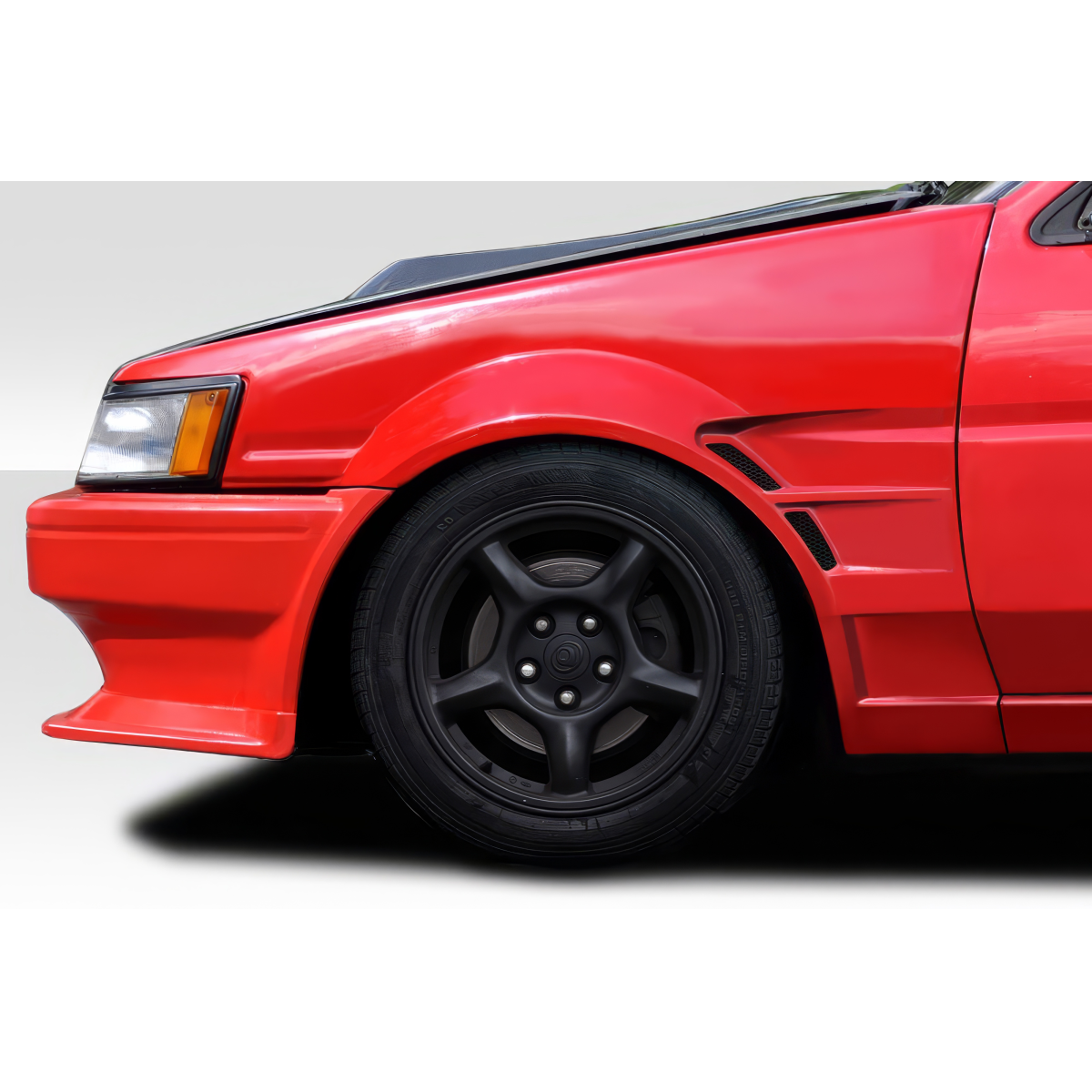 Modify your Toyota Corolla 1984 with our Exterior/Fenders - Front side angle of the fender view