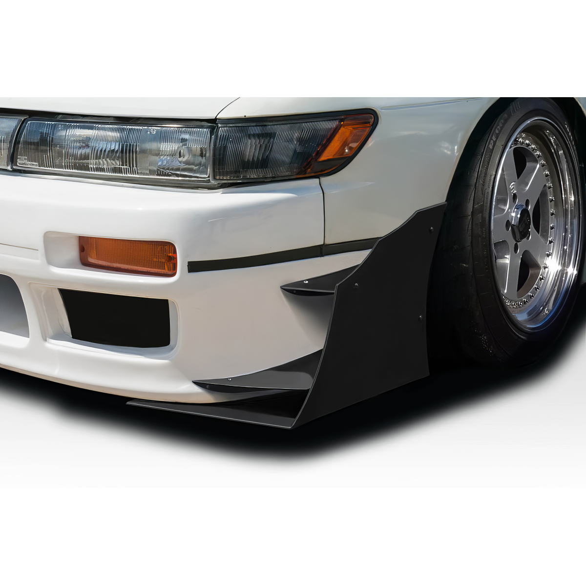 Modify your Nissan Silvia 1989 with our Exterior/Canards - Part is shown at a low frontal angle