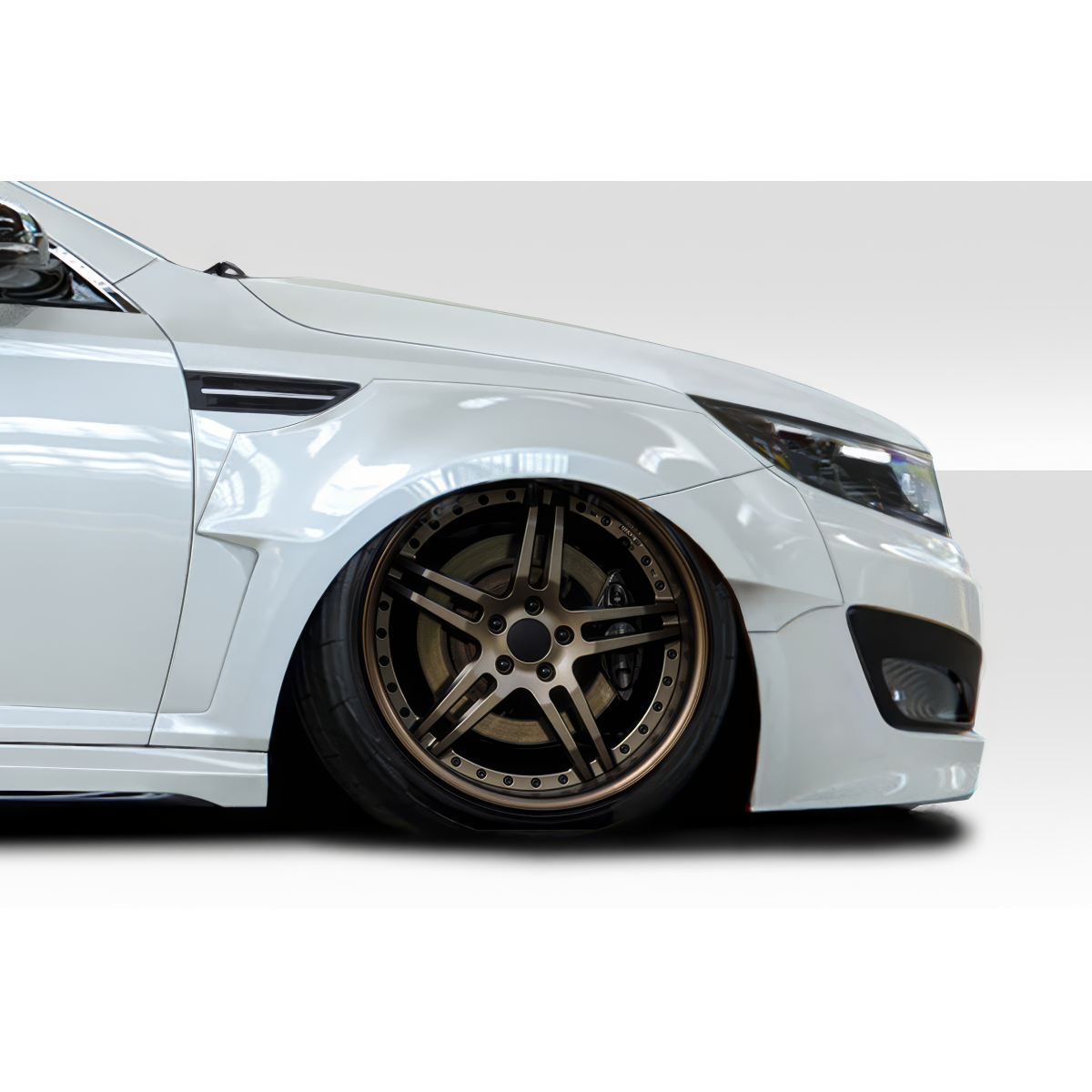 Modify your KIA Optima 2011 with our Exterior/Complete Body Kits - Side angle view of a lowered KIA Optima