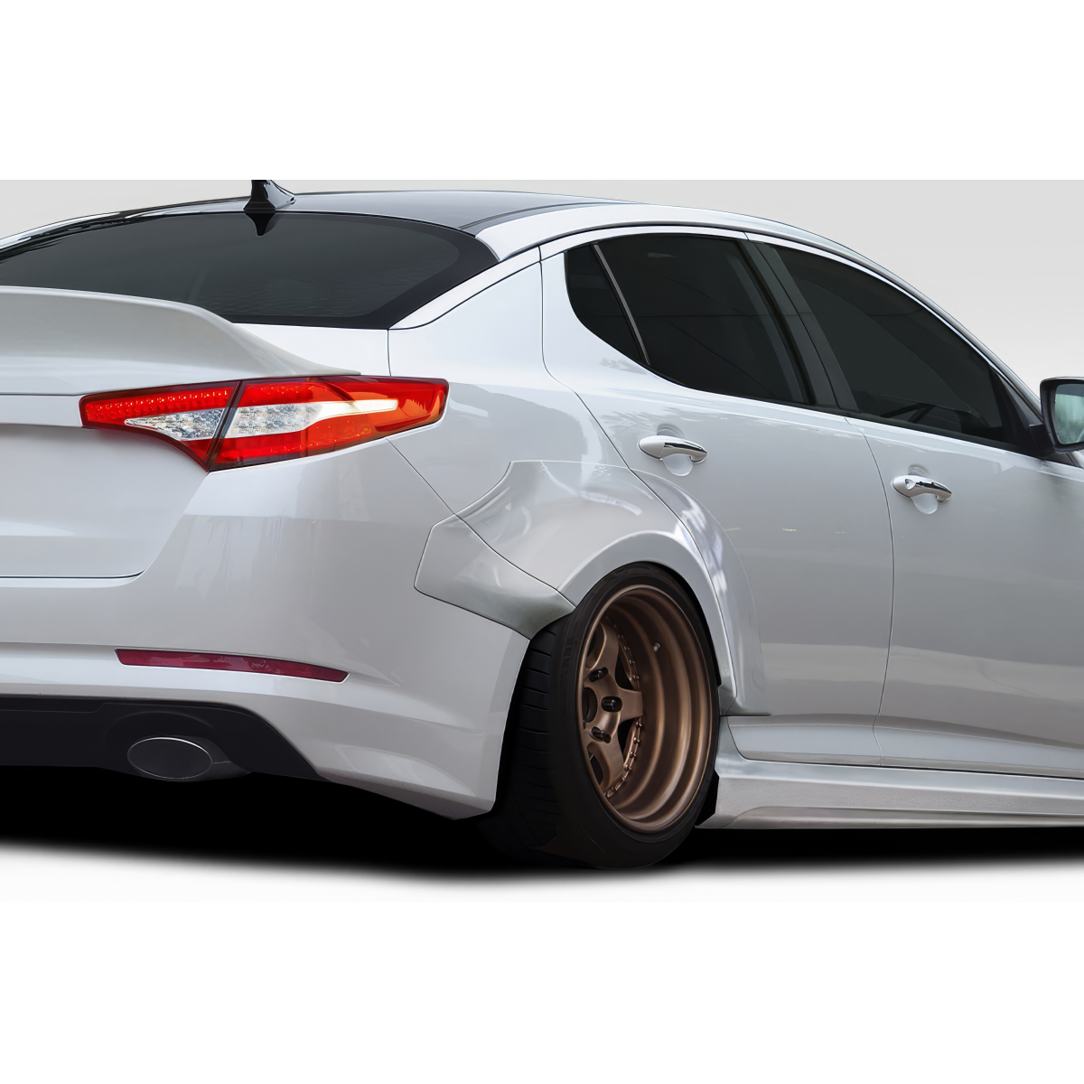 Modify your KIA Optima 2011 with our Exterior/Complete Body Kits - Rear angle showcases body kit details and styling