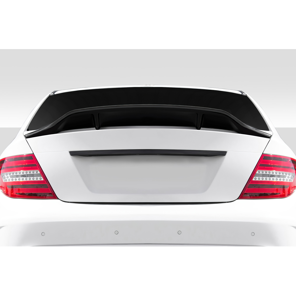 Modify your Mercedes-Benz C300 2008 with our Exterior/Wings - Rear angle view of the spoiler on a car