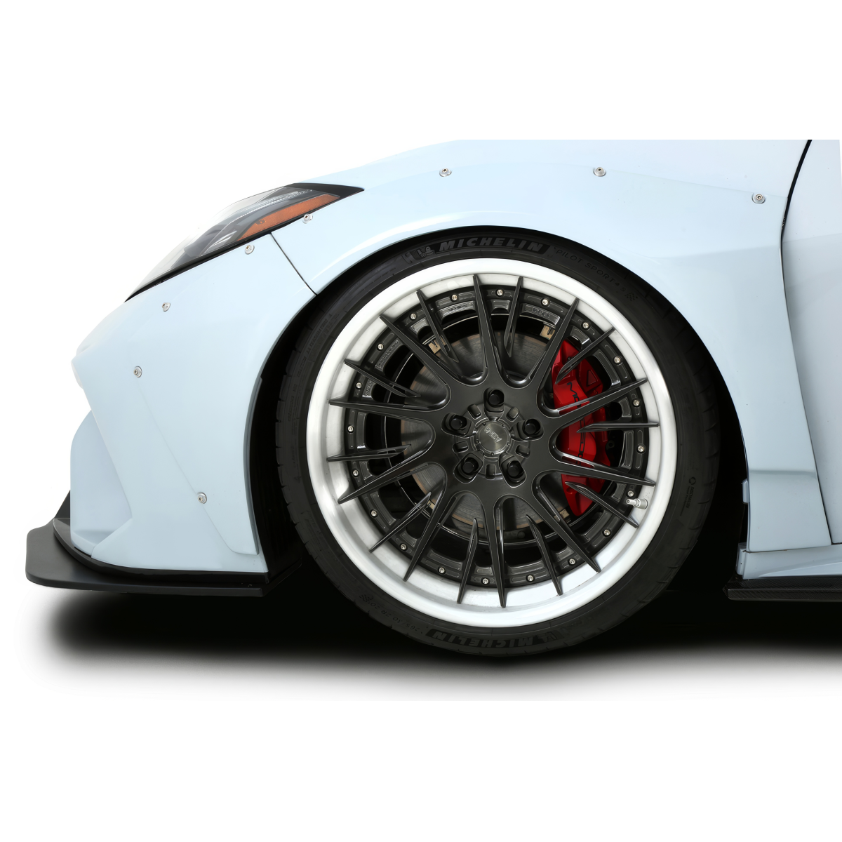 Modify your Chevrolet Corvette 2020 with our Exterior/Fenders - View from low side angle showcasing wheel and fender