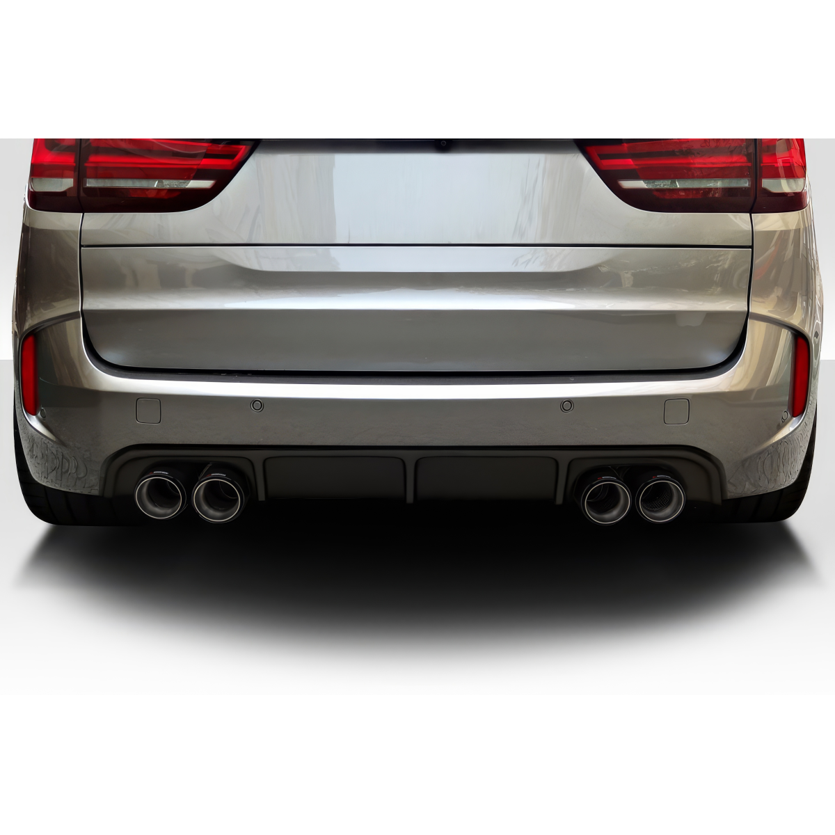 Modify your BMW 3-Series 2014 with our Exterior/Diffusers - Rear view from a low angle showing exhaust tips