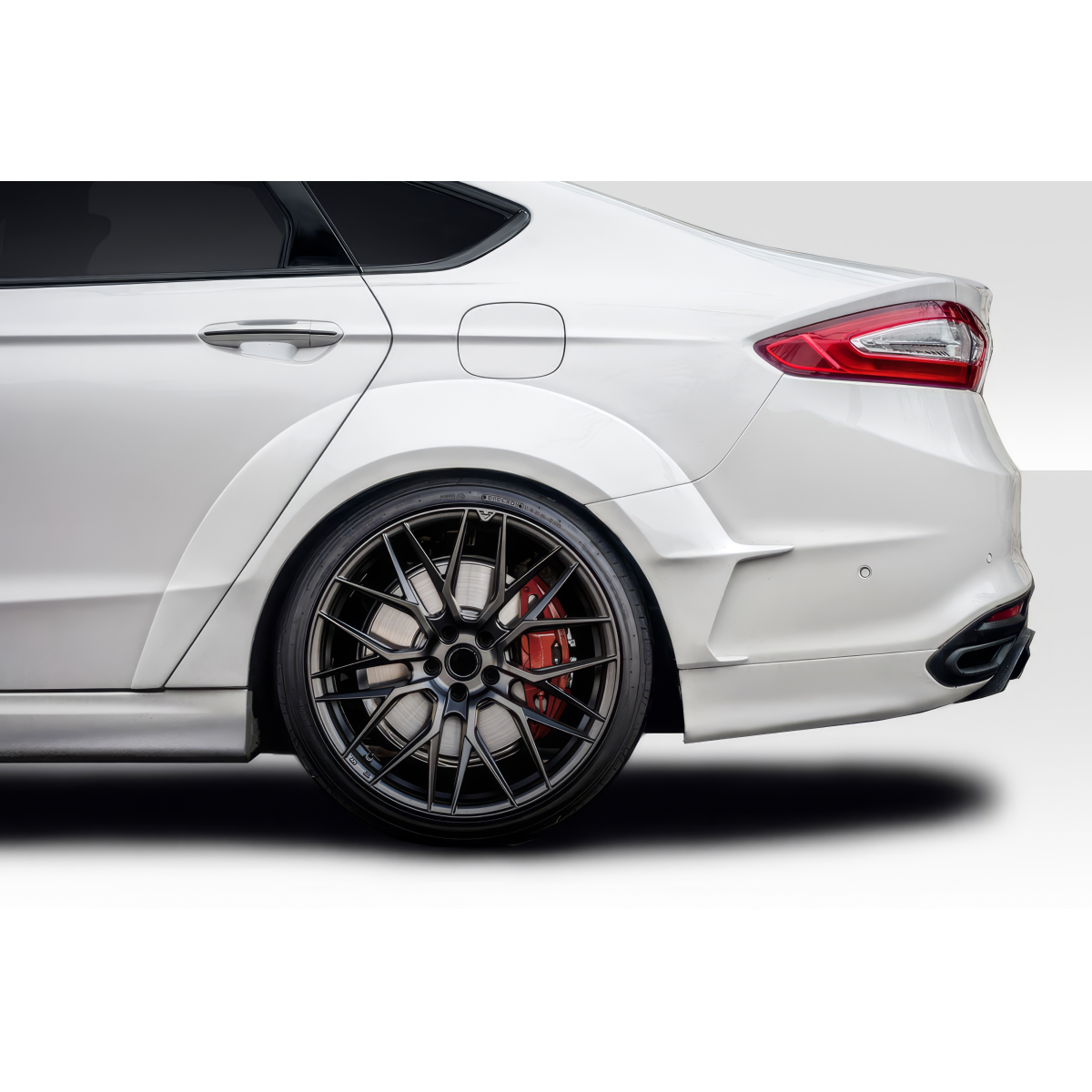 Modify your Ford Fusion 2013 with our Exterior/Fenders - Side angle view of a Ford Fusion rear fender