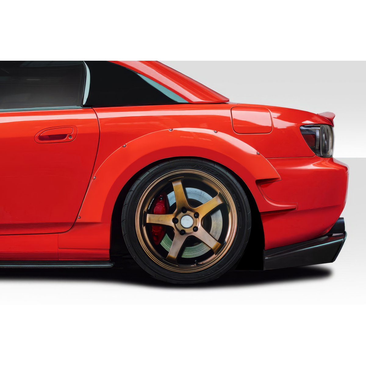 Modify your Honda S2000 2000 with our Exterior/Fenders - Side angle showing the rear fender and wheel