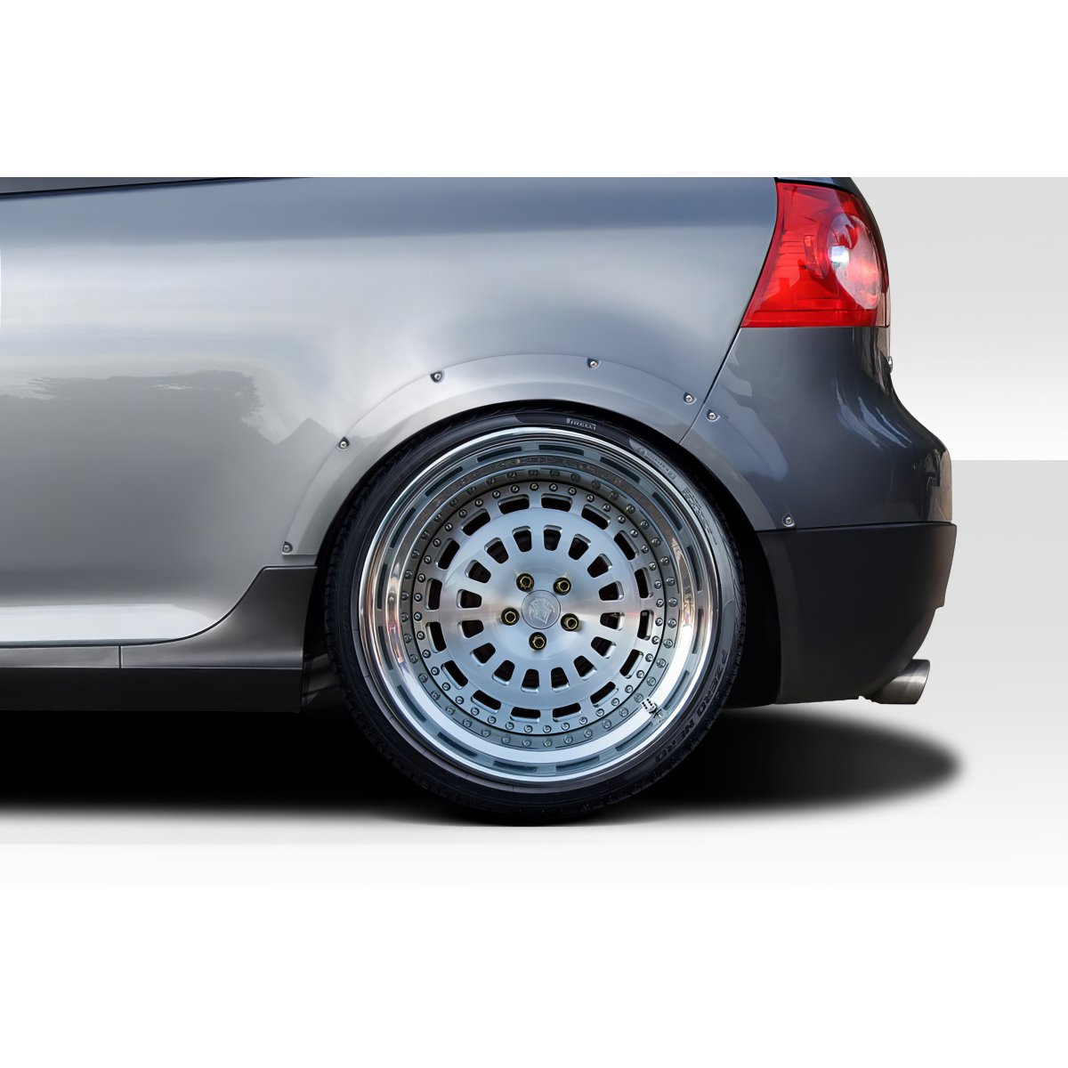 Modify your Volkswagen Golf 2006 with our Exterior/Fenders - Side angle showing custom wheel and fender flare