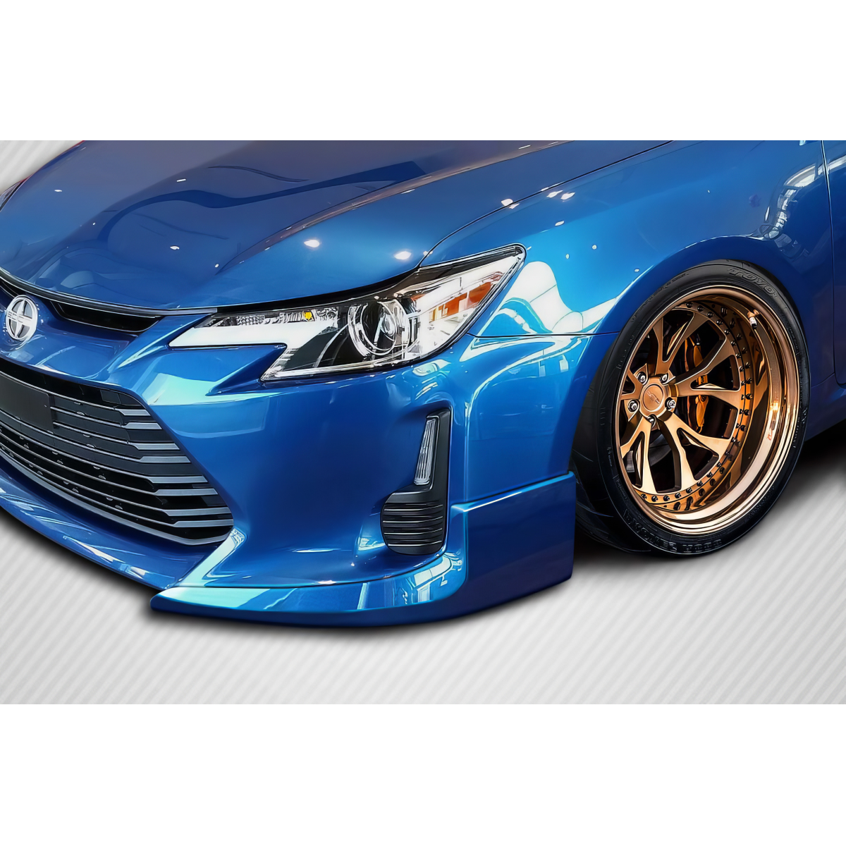 Modify your Scion tC 2011 with our Exterior/Front Bumpers or Lips - Part shown at a slight angle from the front