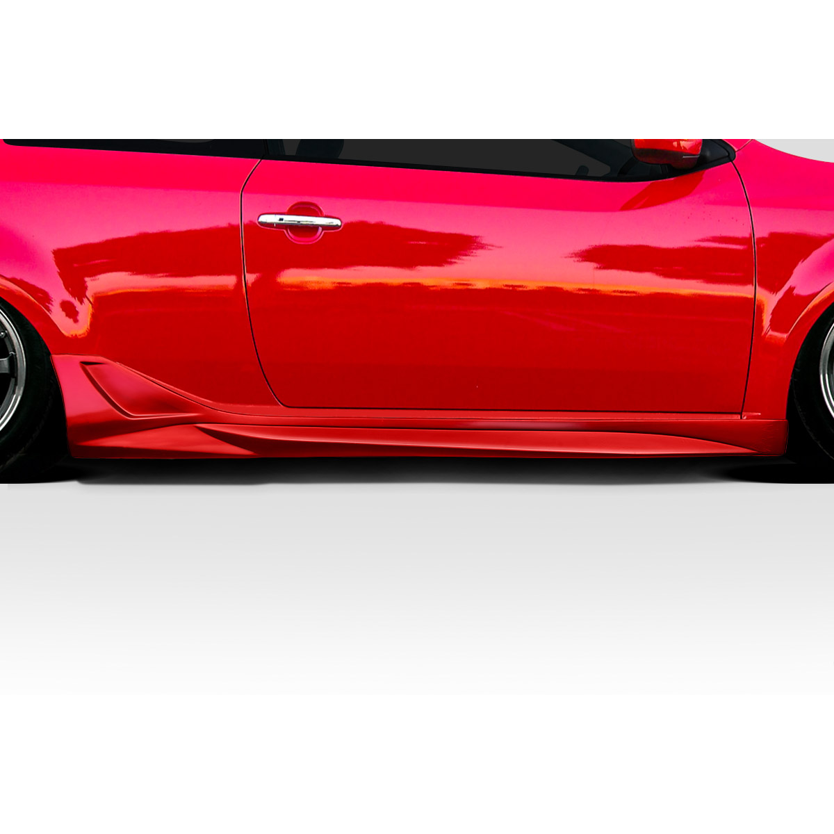 Modify your KIA Forte 2010 with our Exterior/Side Skirts - Side view of the car at a low angle