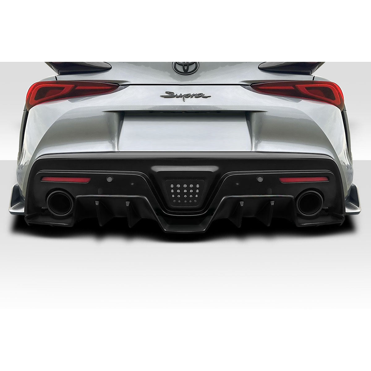 Modify your Toyota Supra 2019 with our Exterior/Rear Bumpers or Lips - Rear angle showcasing diffuser design and features