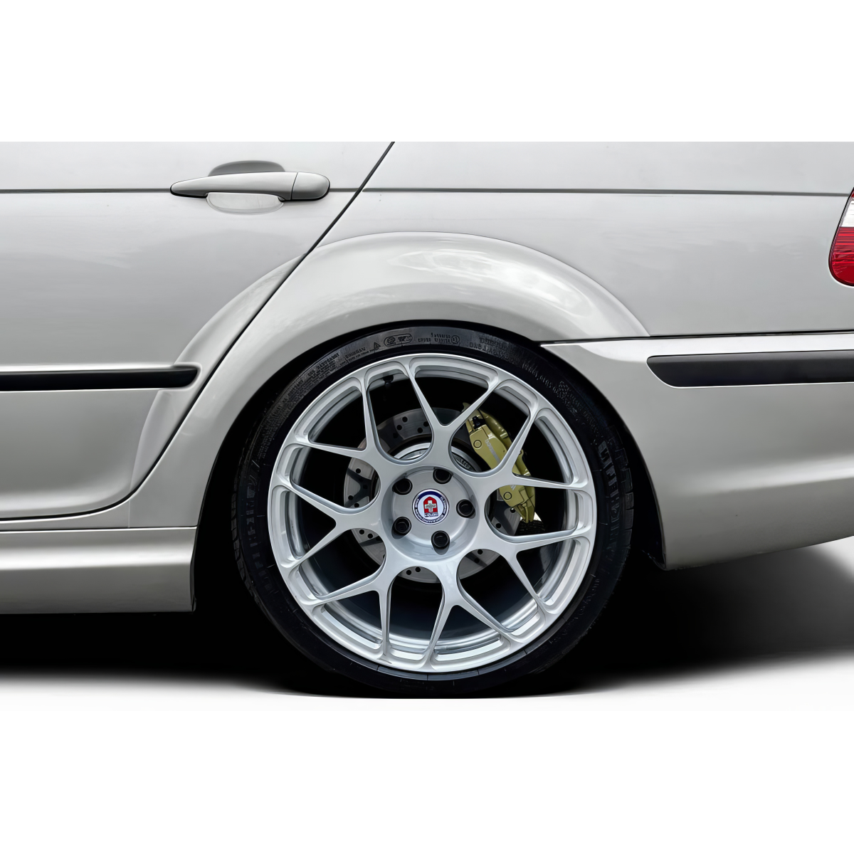 Modify your BMW 3-Series 2001 with our Exterior/Fenders - Side angle view of BMW wheel and fender