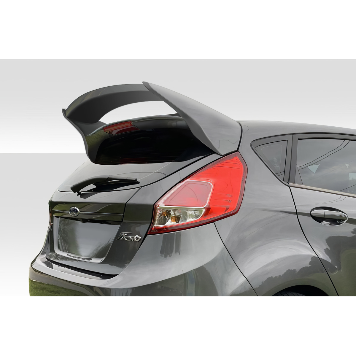 Modify your Ford Fiesta 2014 with our Exterior/Wings - Rear angle view of the spoiler on the vehicle