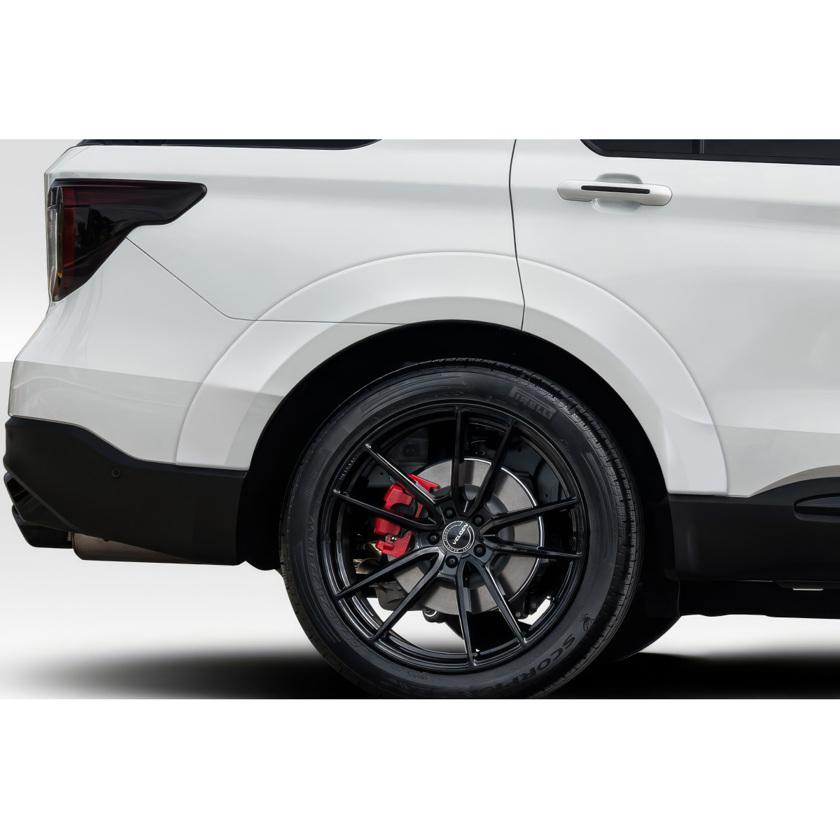 Modify your Ford Explorer 2020 with our Exterior/Fenders - Side angle view of fender flares on vehicle