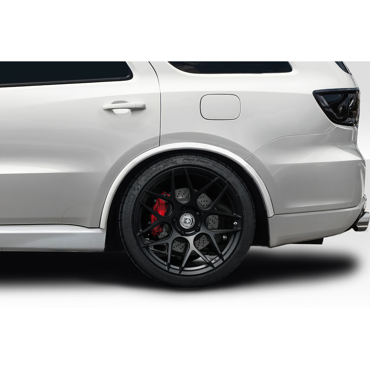 Modify your Dodge Durango 2014 with our Exterior/Fenders - Side angle of the rear fender with wheel