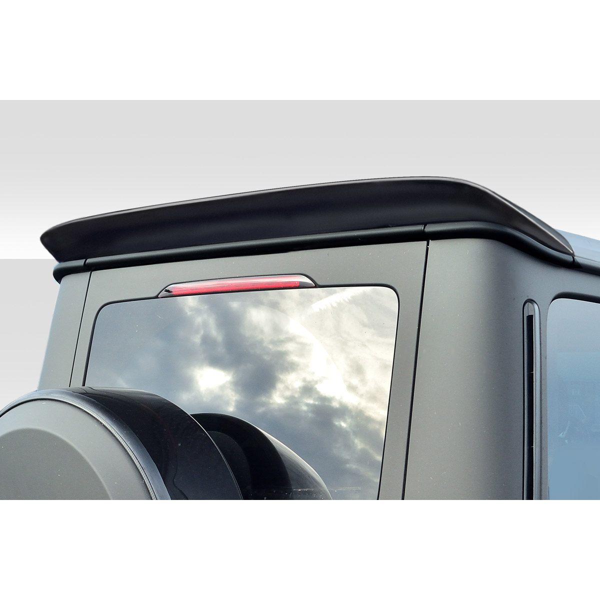 Modify your Mercedes-Benz G-Class 2000 with our Exterior/Wings - Top rear angle of the vehicle showing the spoiler