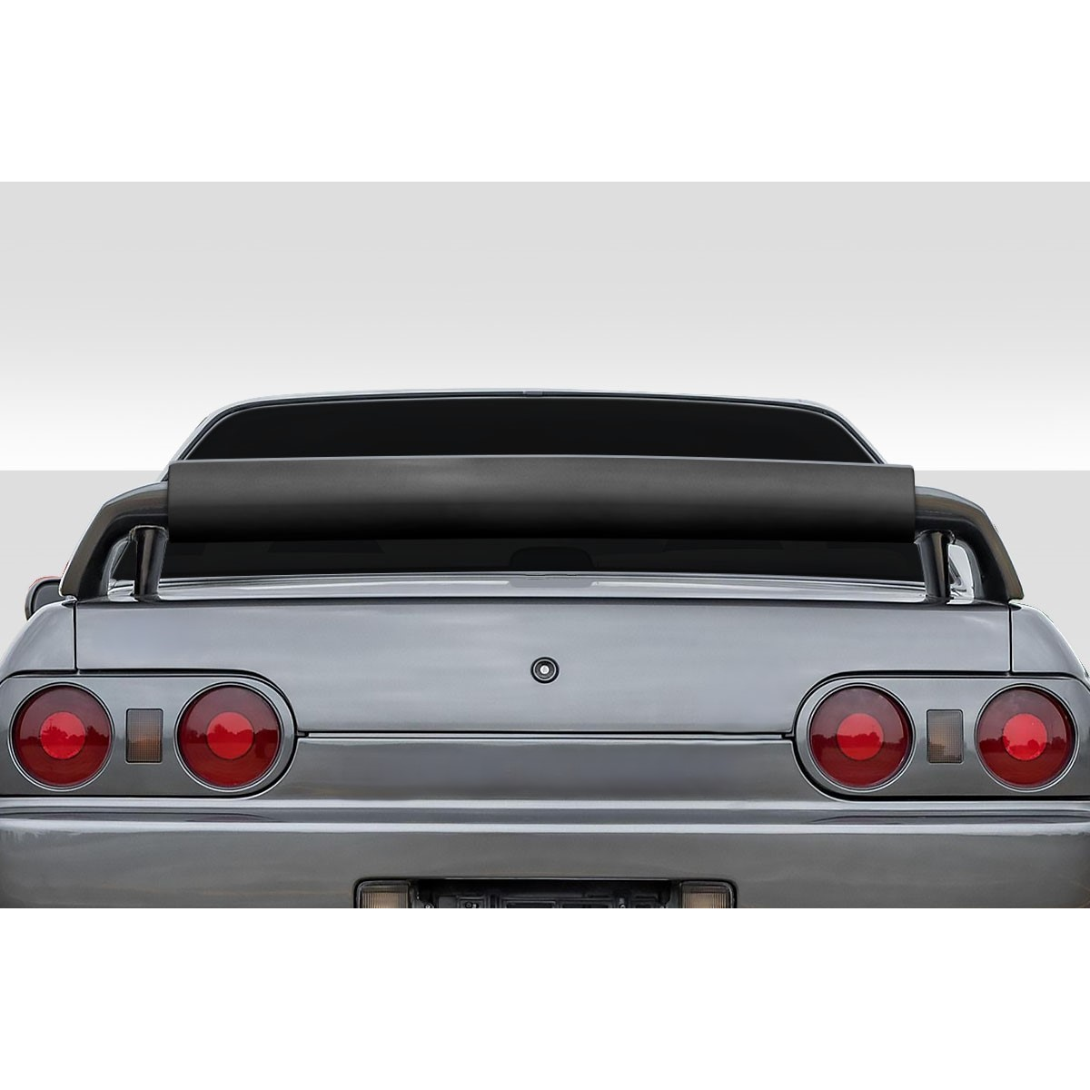 Modify your Nissan Skyline 1989 with our Exterior/Wings - Rear view angle of the Nissan Skyline R32