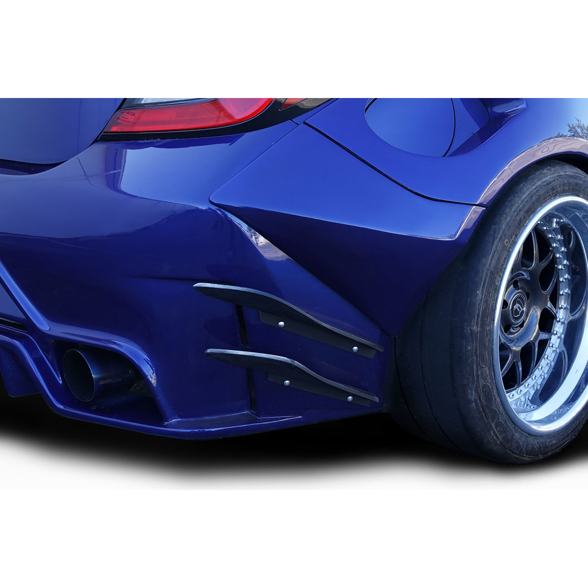 Modify your Subaru BRZ 2022 with our Exterior/Rear Bumpers or Lips - Rear view angle showing bumper canards design