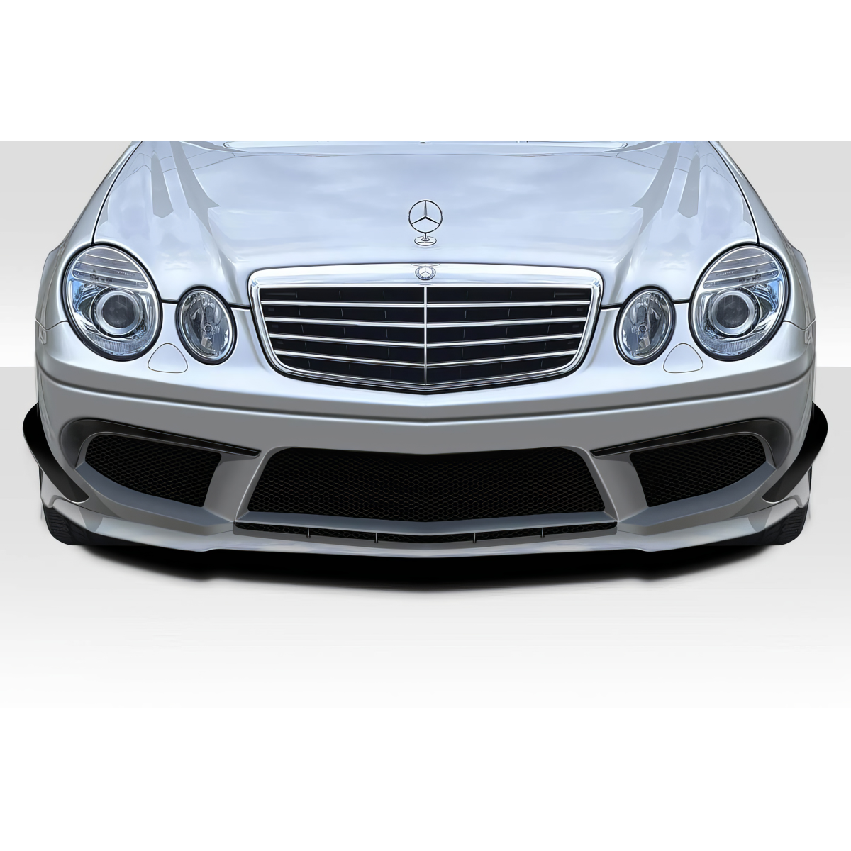 Modify your Mercedes-Benz E55 AMG 2007 with our Exterior/Front Bumpers or Lips - Front view of the vehicle at a low angle