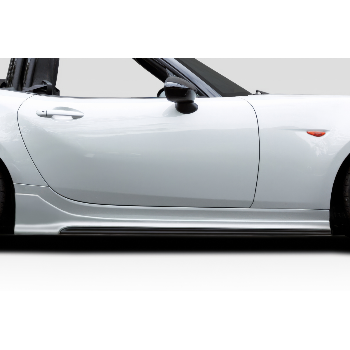 Modify your Mazda Miata 2016 with our Exterior/Side Skirts - Side view at a slight angle