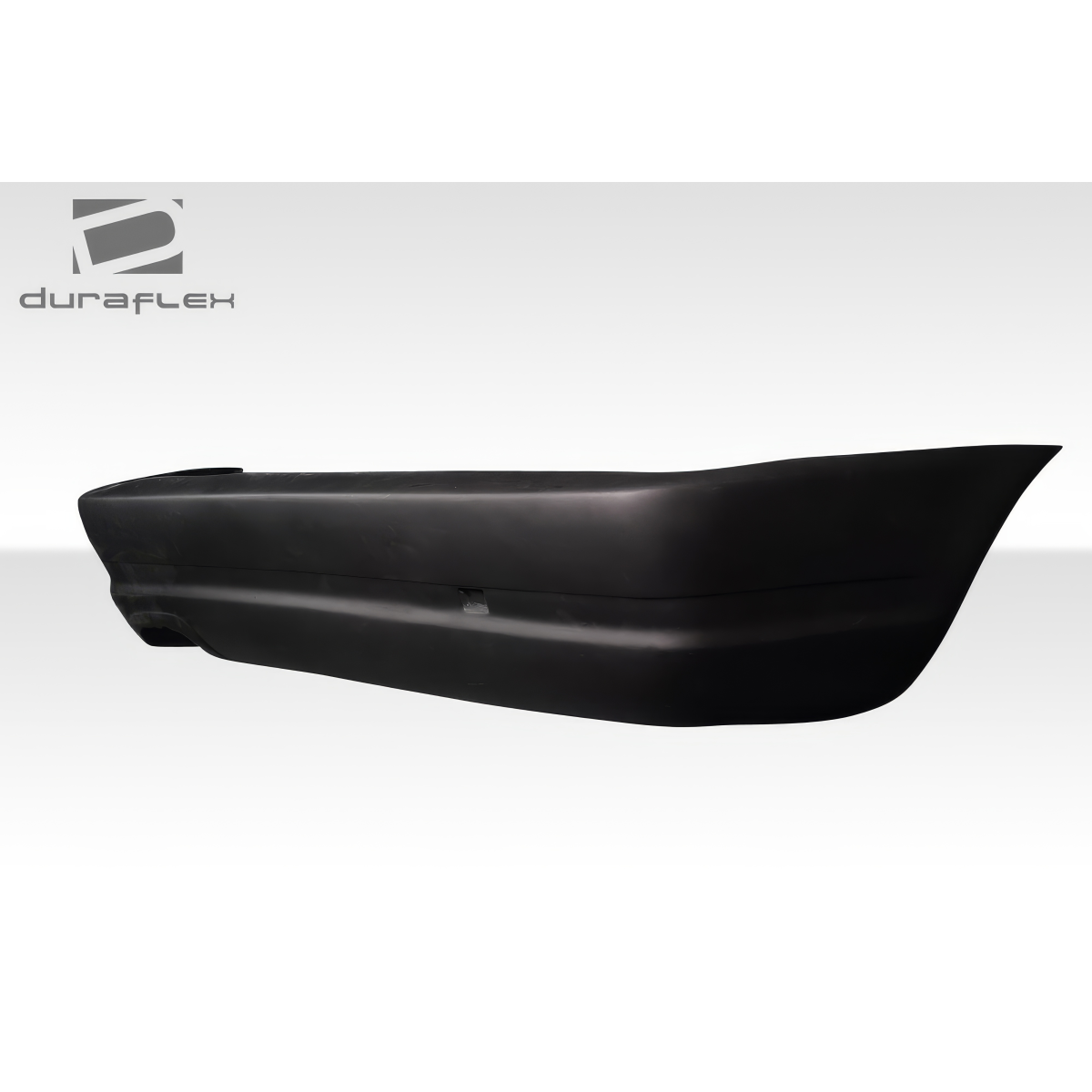 Modify your BMW 3-Series 1999 with our Exterior/Rear Bumpers or Lips - Side profile view of rear bumper at slight angle