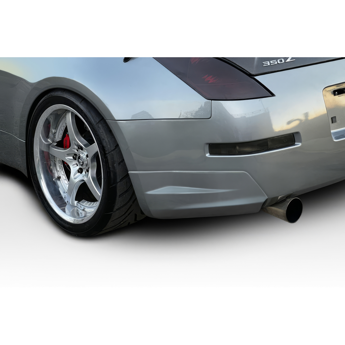 Modify your Nissan 350Z 2003 with our Exterior/Rear Bumpers or Lips - Rear angle view of Nissan 350Z showing rear lip