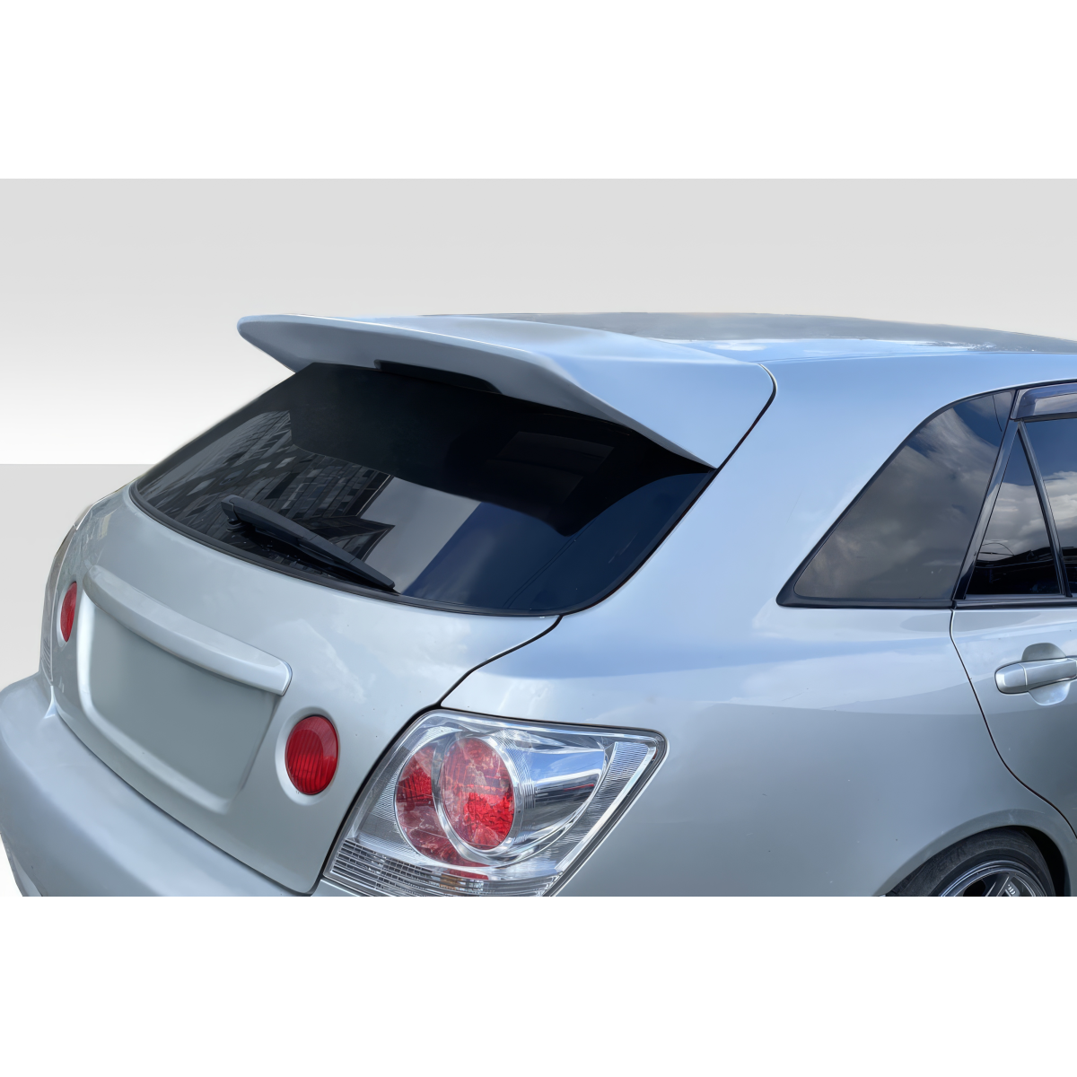 Modify your Lexus IS Series 2000 with our Exterior/Wings - Rear angle view of the vehicle part