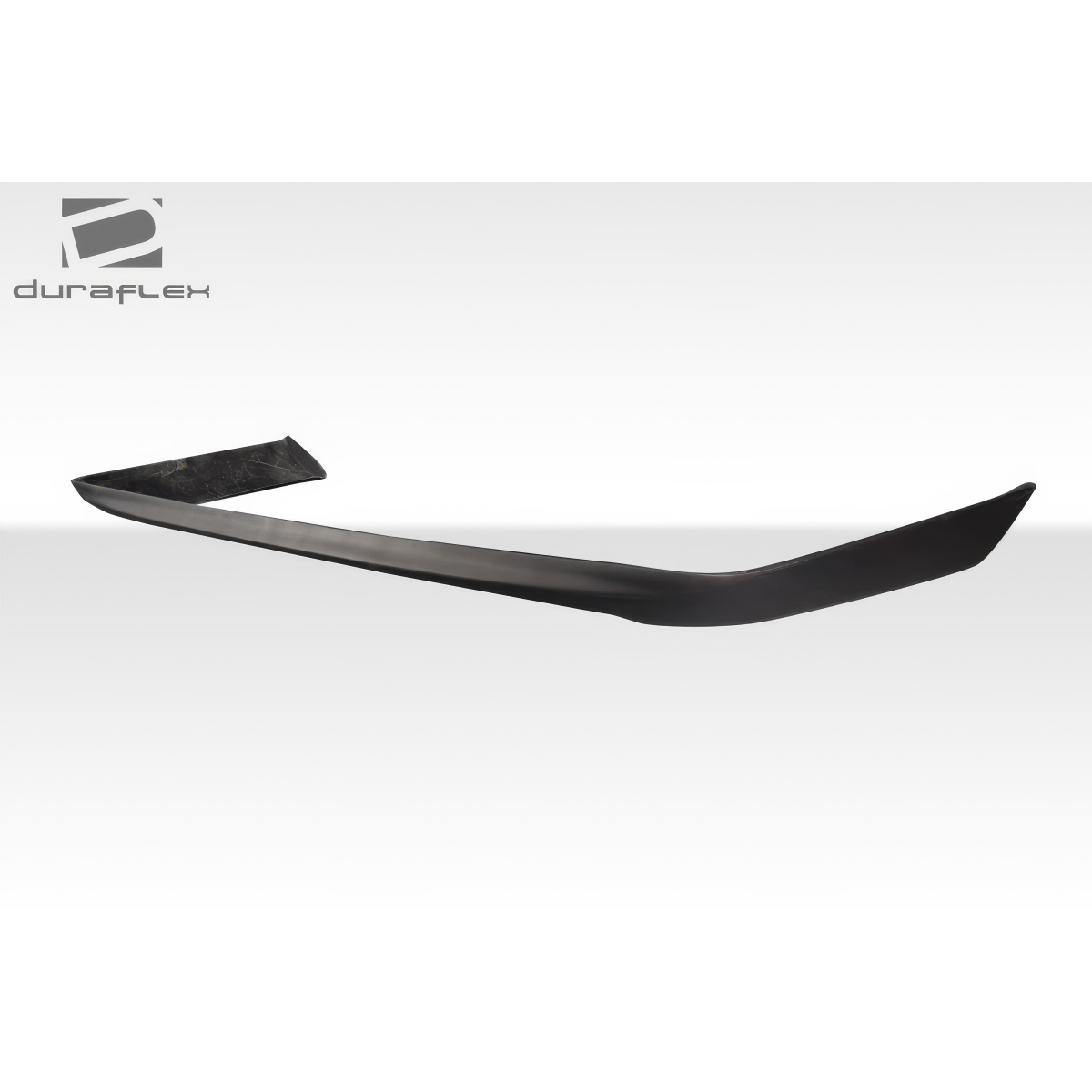 Modify your Mercedes-Benz E-Class 1986 with our Exterior/Rear Bumpers or Lips - Part is shown at a slight angle from above