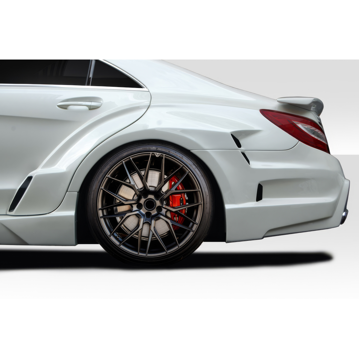 Modify your Mercedes-Benz CLS-Class 2012 with our Exterior/Fenders - Angled view showing rear fender and wheel details