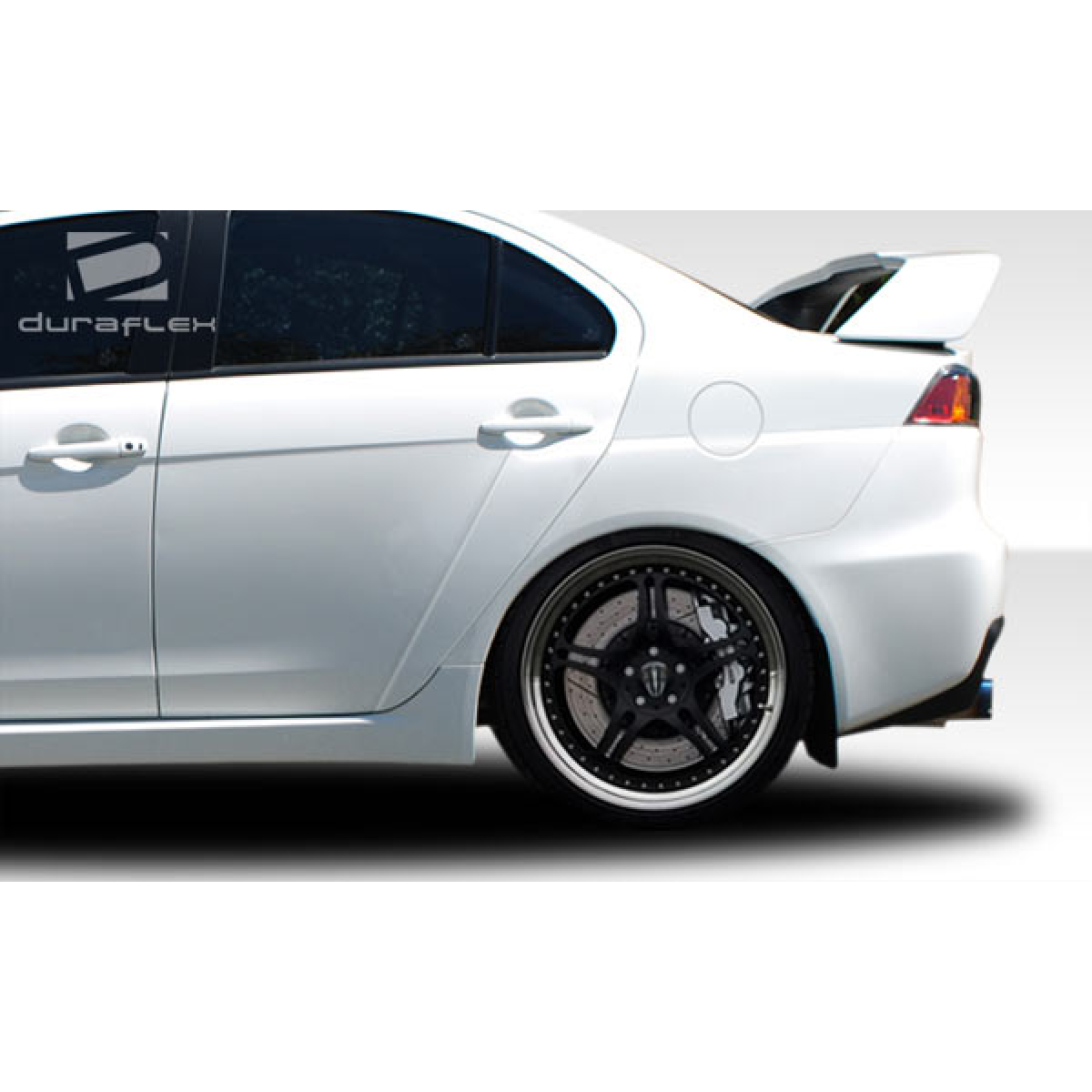 Modify your Mitsubishi Evolution 2008 with our Exterior/Wings - Side angle view of vehicle showing spoiler design