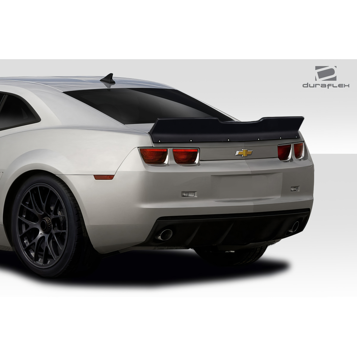 Modify your Chevrolet Camaro 2010 with our Exterior/Wings - Rear angle of a Chevrolet Camaro with spoiler