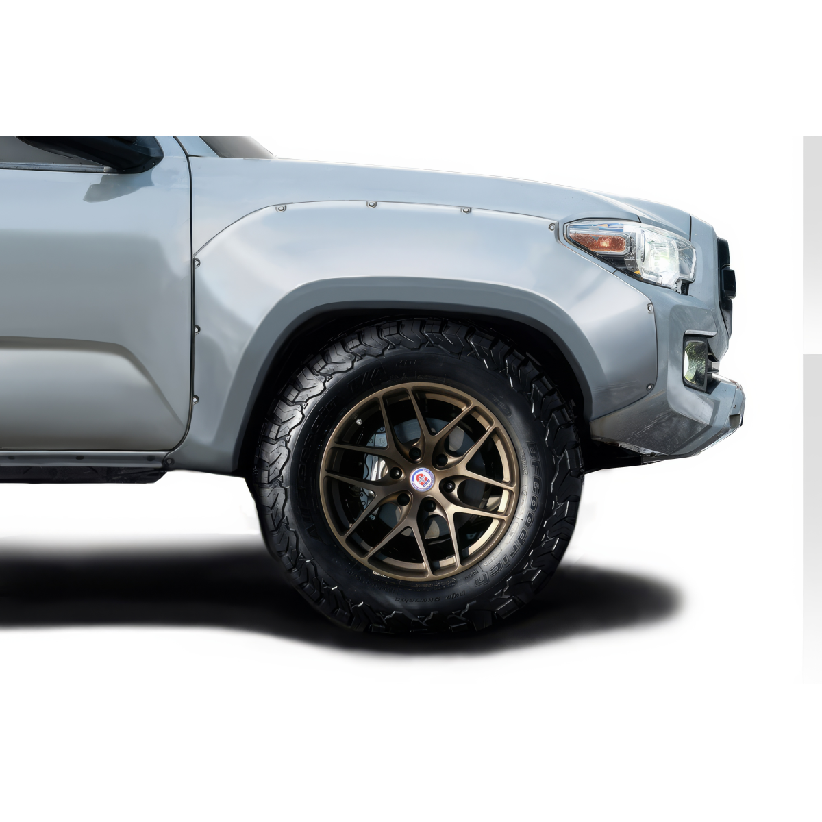 Modify your Toyota Tacoma 2016 with our Exterior/Fenders - Front right angle of a Toyota Tacoma fender flare