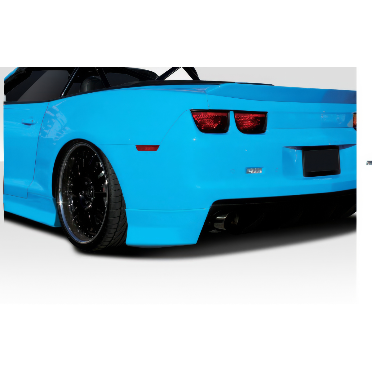 Modify your Chevrolet Camaro 2010 with our Exterior/Rear Bumpers or Lips - Rear angle view of a modified Camaro