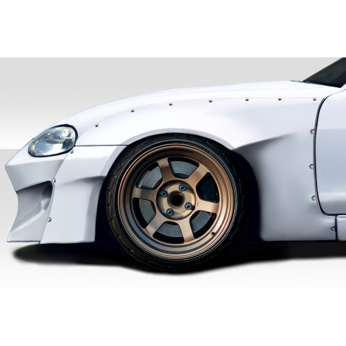 Modify your Mazda Miata 1999 with our Exterior/Fenders - Side angle of a modified car fender and wheel