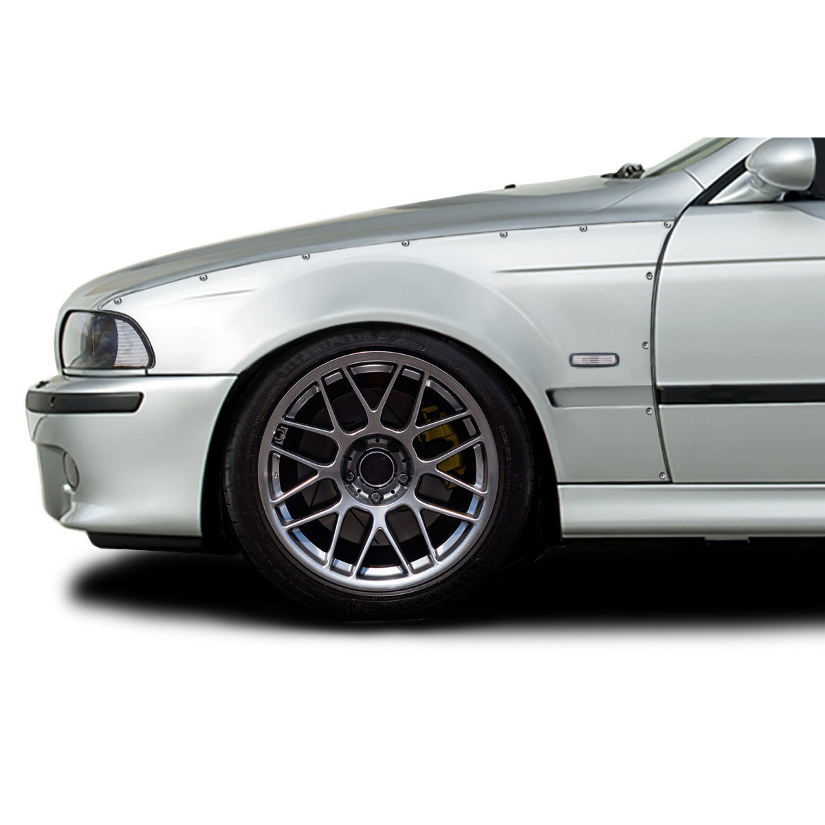 Modify your BMW 5-Series 1997 with our Exterior/Fenders - Side angle view of the vehicle fender and wheel