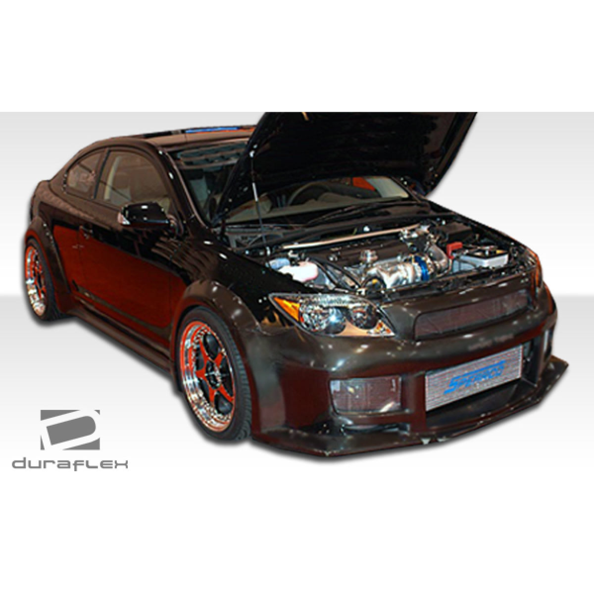 Modify your Scion tC 2005 with our Exterior/Side Skirts - Front left angle showing side skirts clearly