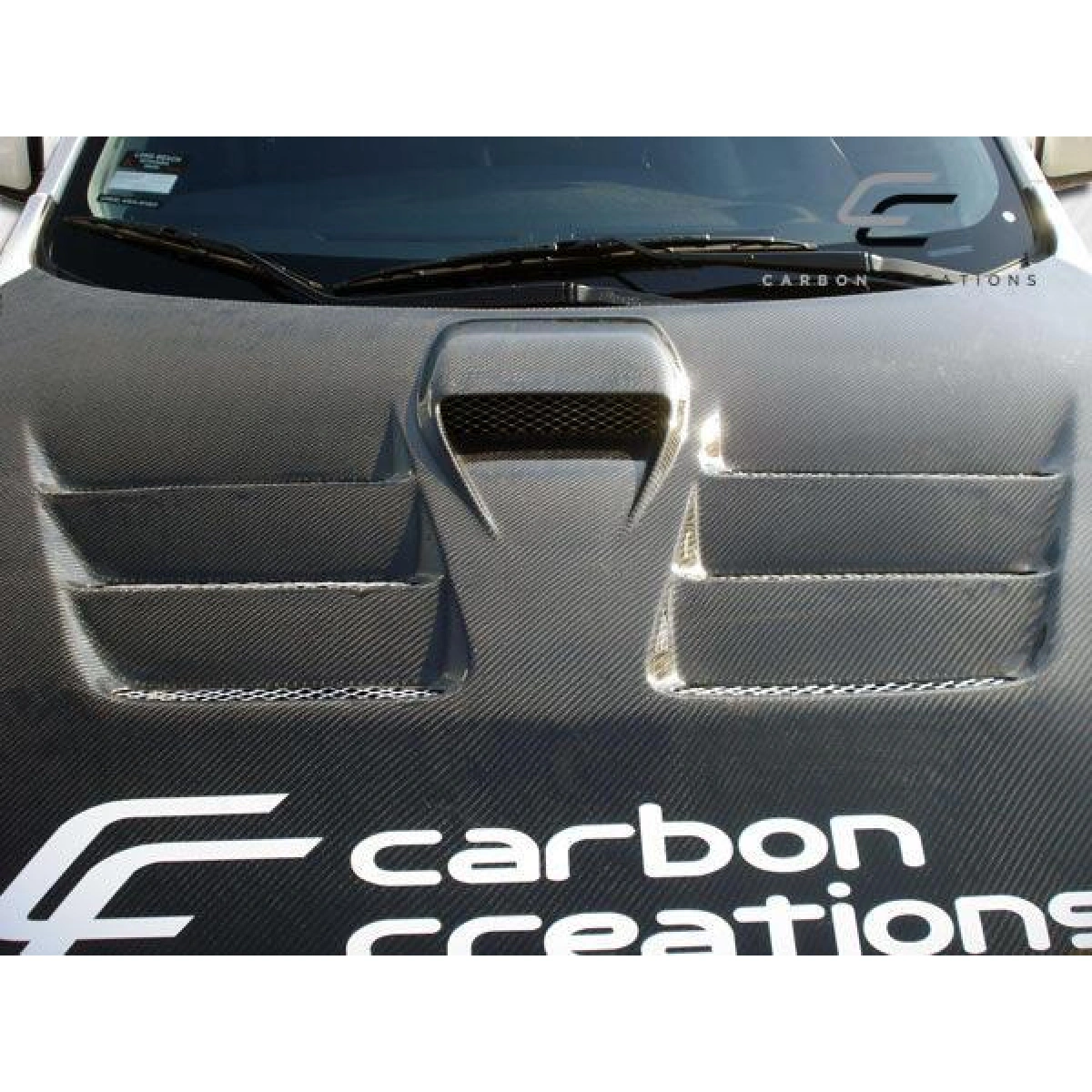 Modify your Mitsubishi Evolution 2008 with our Exterior/Hoods - 10