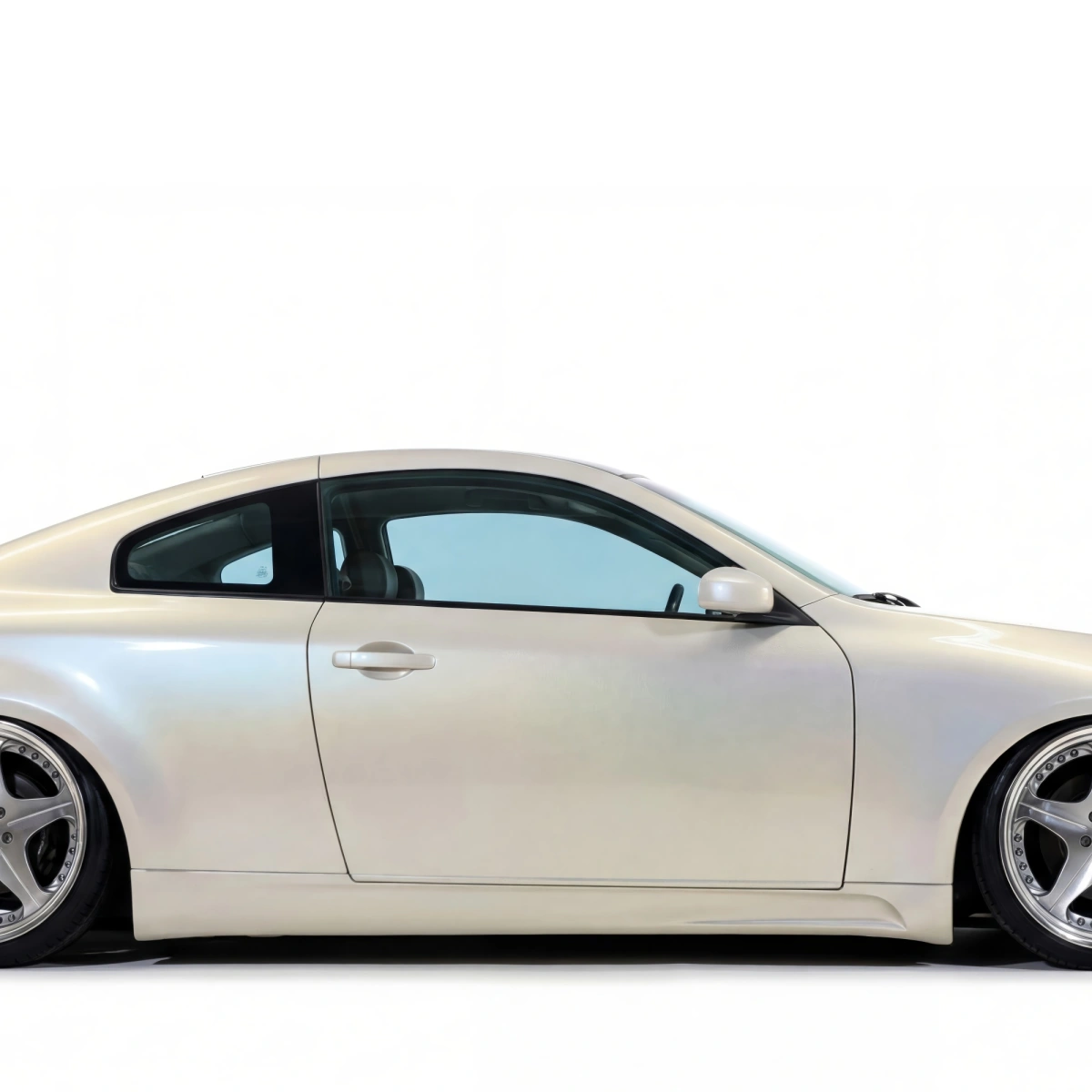 Modify your Infiniti G35 2003 with our Exterior/Side Skirts - 1